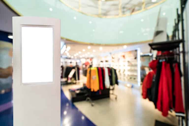 blank digital sign in indoor clothing store