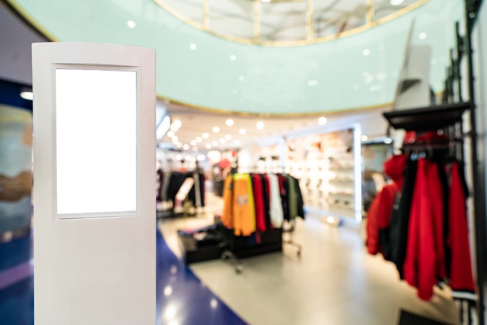 blank digital sign in indoor clothing store
